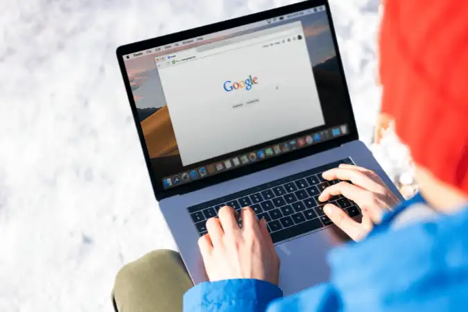 Person comparing CIM Level 3 and Google Digital Marketing Certificate options.
