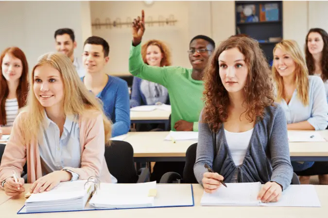 Group of diverse apprentices and students in a classroom