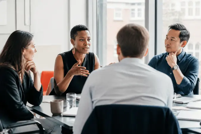 Learners and an expert discussing workplace development