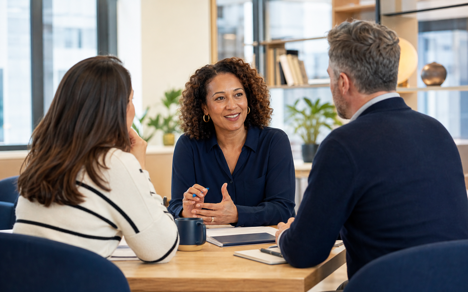Manager supporting a team development conversation